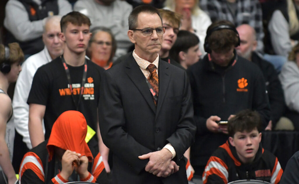 Scott Marry monitors the action on Feb. 28 after becoming the state’s all-time winningest wrestling coach during the semifinals earlier that day. (Photo courtesy of MHSAA)
