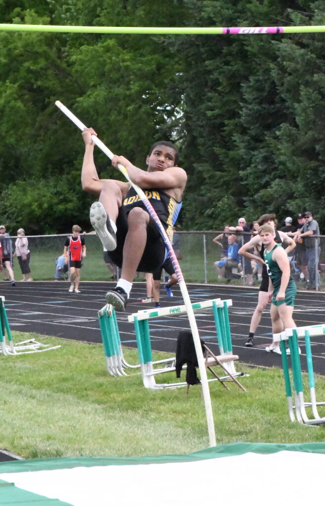 Mark Moulding competes for Madison in the pole vault.