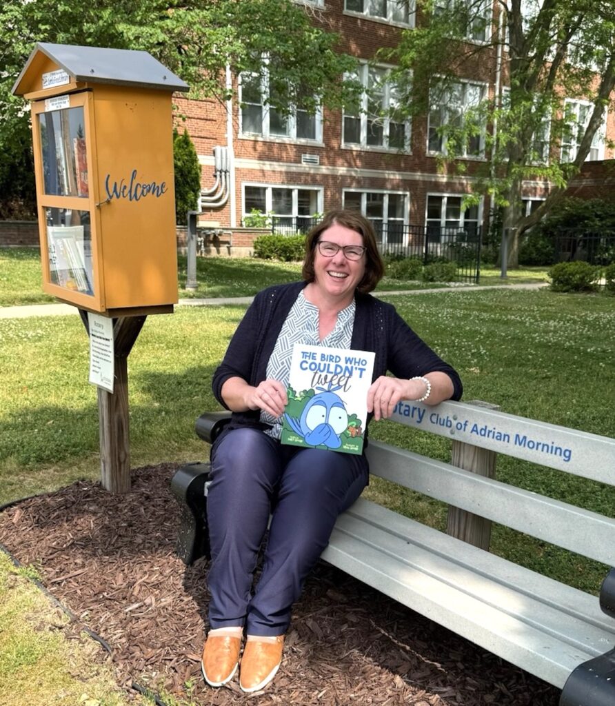Darcy Gifford is pictured with a copy of her book, “The Bird Who Couldn’t Tweet.” (Photo by Renee Lapham Collins)