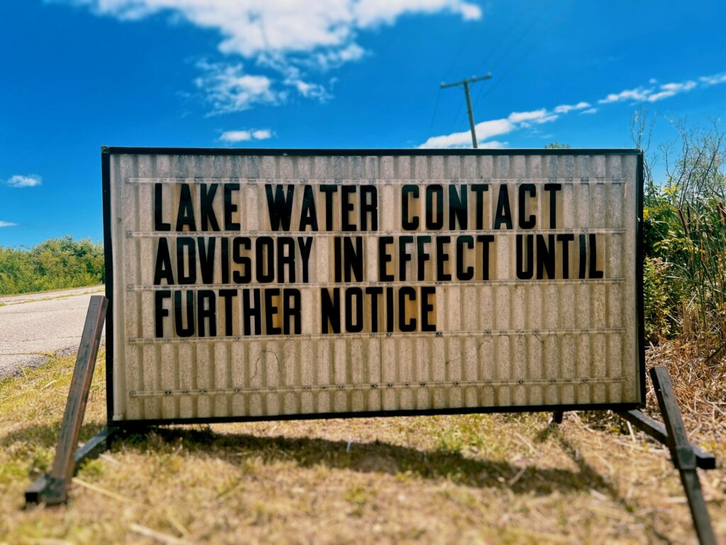 A Lake Erie beach closure due to algae bloom on July 30, 2022. (Photo by Susan J. Demas, Michigan Advance)