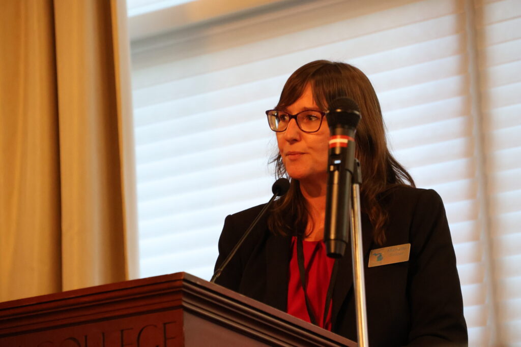 Michelle Selzer, Western Lake Erie Basin strategist for the Michigan Department of Agriculture and Rural Development, speaks on December 12 at Adrian College. (Photo by Kyle Davidson, Michigan Advance)