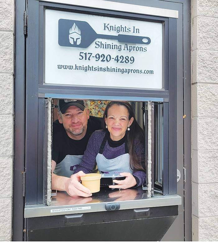 Deven and Jennifer Knight lean out of the drive-through window at Knights in Shining Aprons, located in North Town Commons at 1325 N. Main St.