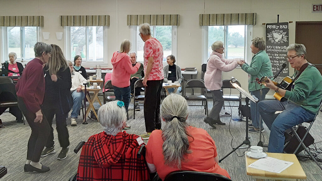 People dance and listen to music during a Memory Cafe organized by Dementia Friendly Saline. The Rotary Club of Clinton recently hosted a presentation by Jim Mangi, the founder of Dementia Friendly Saline, on how communities can become better places for people with dementia to live.