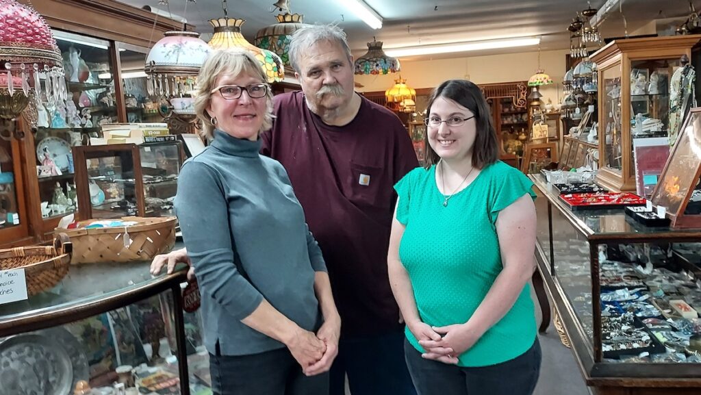 Pictured inside The Hitching Post are Theresa Nelson, Ken Nelson, and Kelly Overholt. The store was founded in 1984 by John and Marlene Nelson.