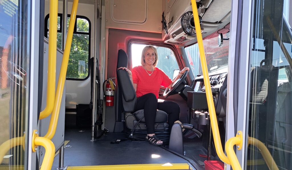 Kate Daisher, pictured here on a Lenawee Public Transportation Authority bus, is the LPTA’s executive director.