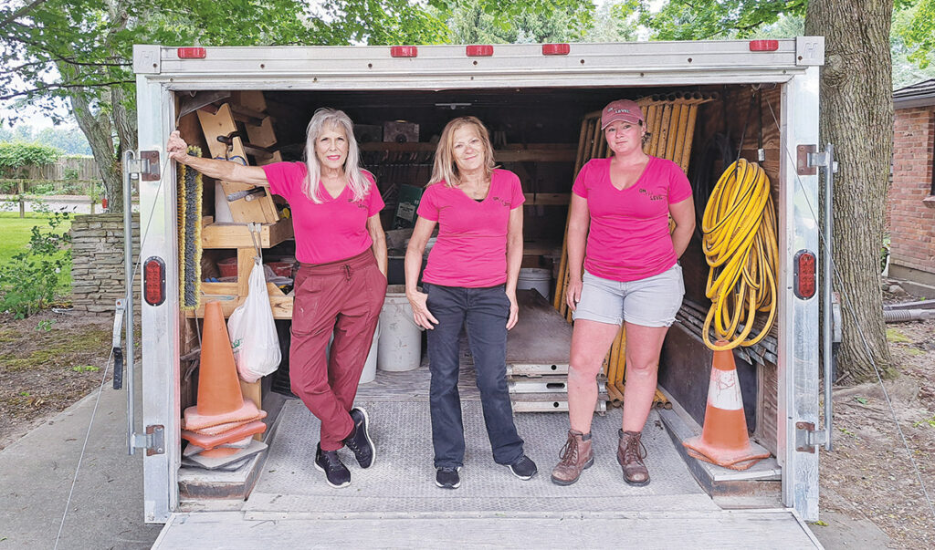 Jeanie DeCocker, owner of On the Level Masonry Restoration, with her employees, Dawn Moran and Cagni Karl.