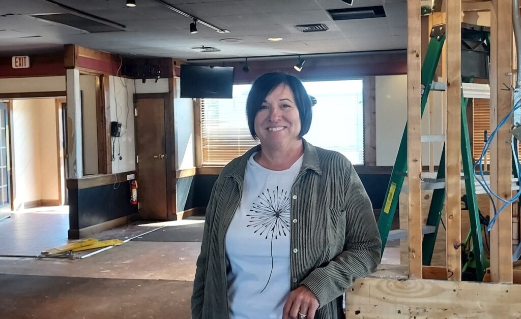 Lisa Walter, co-owner of Winchesters Restaurant and Saloon in Delta, Ohio, is pictured inside the future location of Bits & Brews, which she and her husband hope to open in January at the former JR’s location in Adrian.