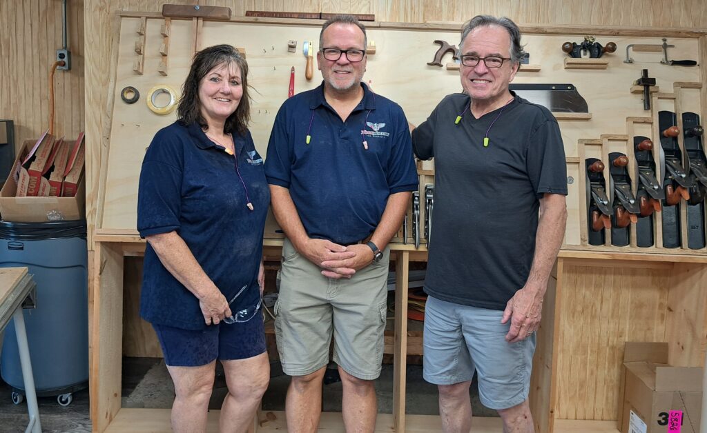 Terri Butler, Randy Lighthall and John Abbey are pictured at Woodworking for Warriors’ new woodshop in Tipton. The program started out at the Sam Beauford Woodworking Institute in Adrian and is now spinning off on its own.