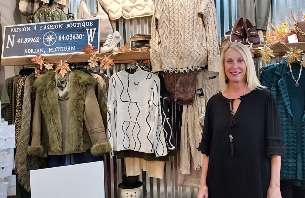 Gloria Kuntz is pictured inside Passion 4 Fashion, the downtown Adrian boutique that she opened 10 years ago on North Main Street. The store offers clothing, accessories, jewelry, and gifts. (Photo by Julie C. Clemes)