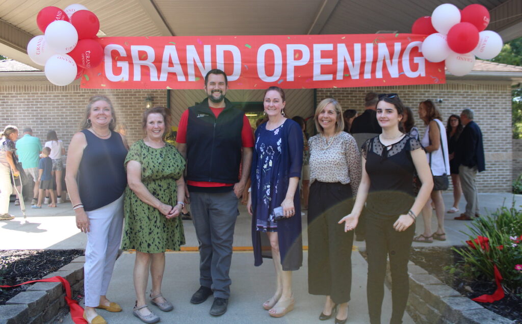 Pictured at the opening of the Addison Youth Center are board members Deanna Redding, Beth Shaw, Pastor Joe Masinick, Lisa Nickels, Diane Smith, and student liaison Olivia Redding. (Photo by Joy McCormick)