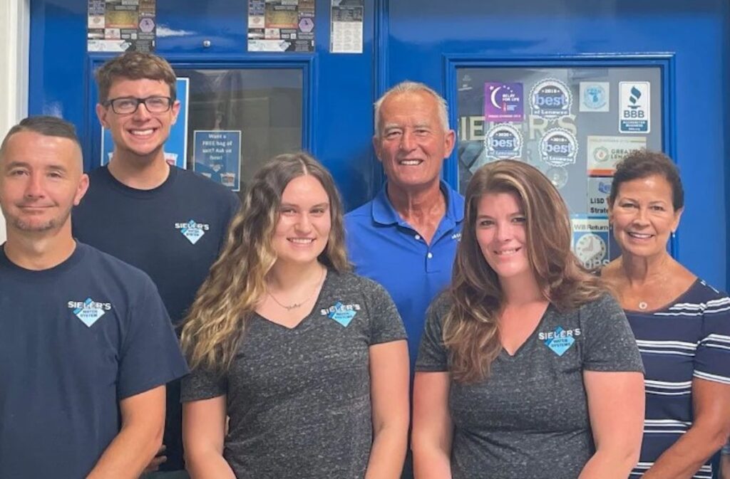 The Sieler’s Water Systems team includes, from left to right: James Ryan, service manager; Cameron Osworth, service technician; Julia Harke, marketing manager; Les Sieler, owner; Tyler McCrate, office manager; and Mary Sieler, bookkeeper.