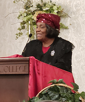 Andre'a Benard, president of the Lenawee County Martin Luther King Jr. Committee, speaks at the 37th annual MLK Jr. Community Celebration at Adrian College.