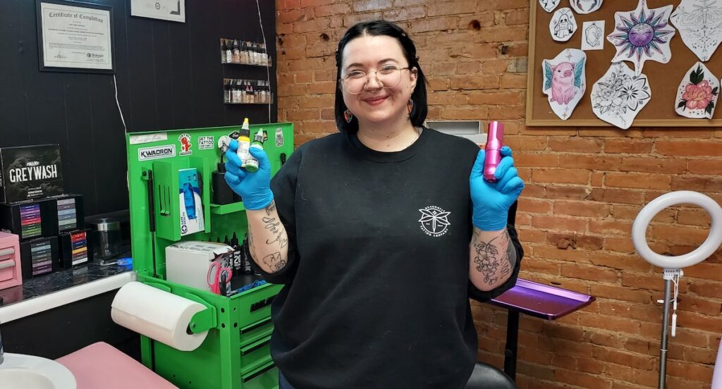 Kari Chapman is pictured at Dragonfly Tattoo Co., which she opened late last year. (Photo by Julie C. Clemes)