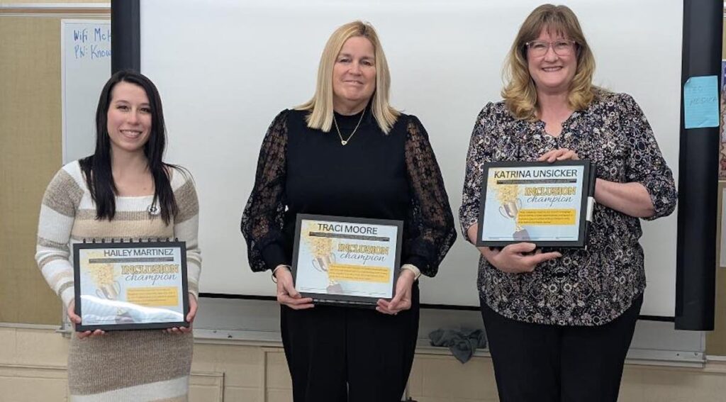 Haley Martinez, Traci Moore and Katrina Unsicker are pictured at the Jan. 27 Adrian school board meeting. (Photo courtesy of Adrian Public Schools)