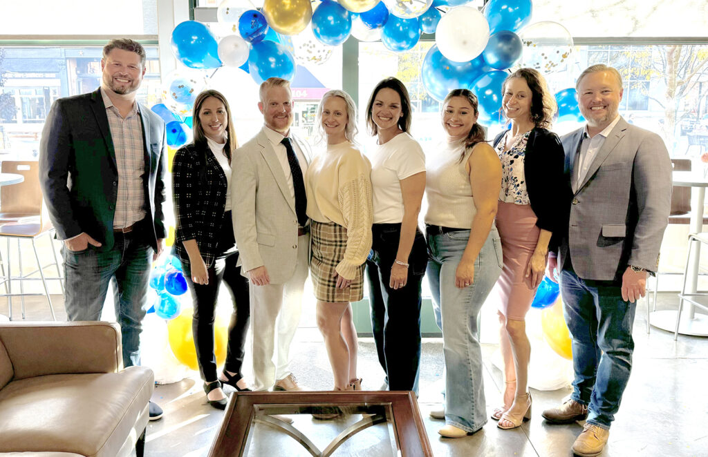 Pictured at Cornerstone Real Estate's Adrian office are Don Wurtzel, Shelly Gutierrez, Jeff Rising, Elizabeth Rising, Heather Marks, Melissa Carlson, and Jack Brown.