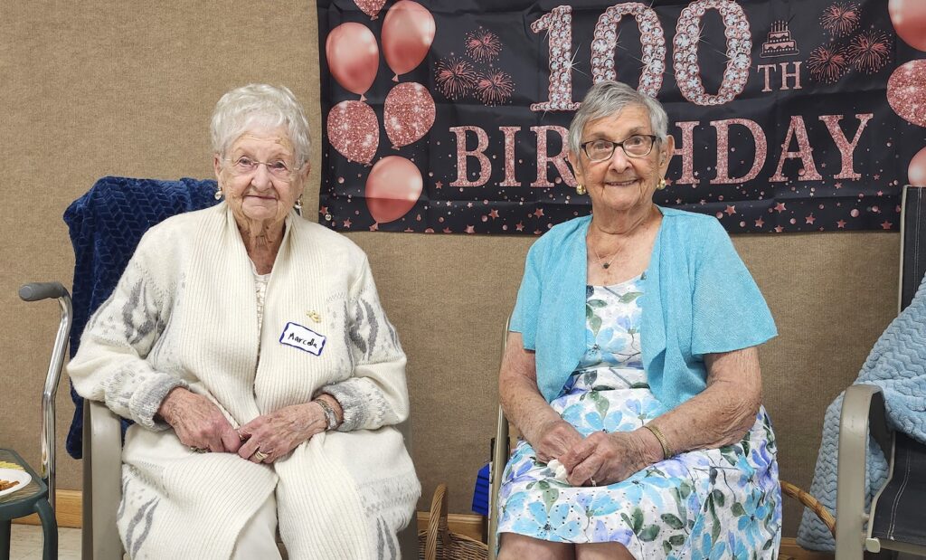 Marcella Barricklow, left, and Doris Morningstar-Bayes are pictured at a May 17 party to mark their 100th birthdays at Durkee-Seager American Legion Post 550 on Onsted. Barricklow turned 100 on May 11, and Morningstar-Bayes’ birthday was eight days later.