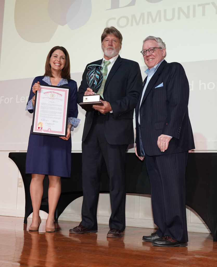 Bob Vogel, center, accepts the Lenawee Leadership Award from Bronna Kahle and Dave Hickman at the Lenawee Community Foundation’s annual breakfast, which took place on April 17 at the Adrian Armory Event Center.