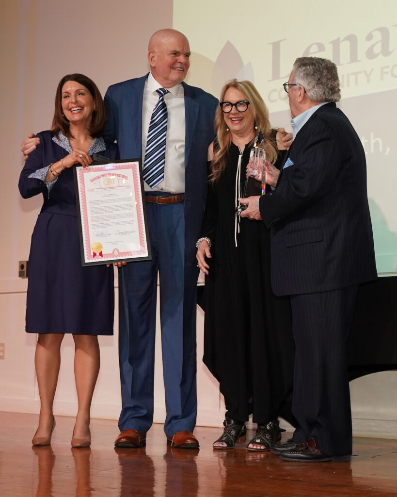 Lenawee Lifetime Legacy Award recipients Gary and Cindi Gray, center, stand with Lenawee Community Foundation executive director Bronna Kahle, left, and board chair Dave Hickman. (LCF photos)