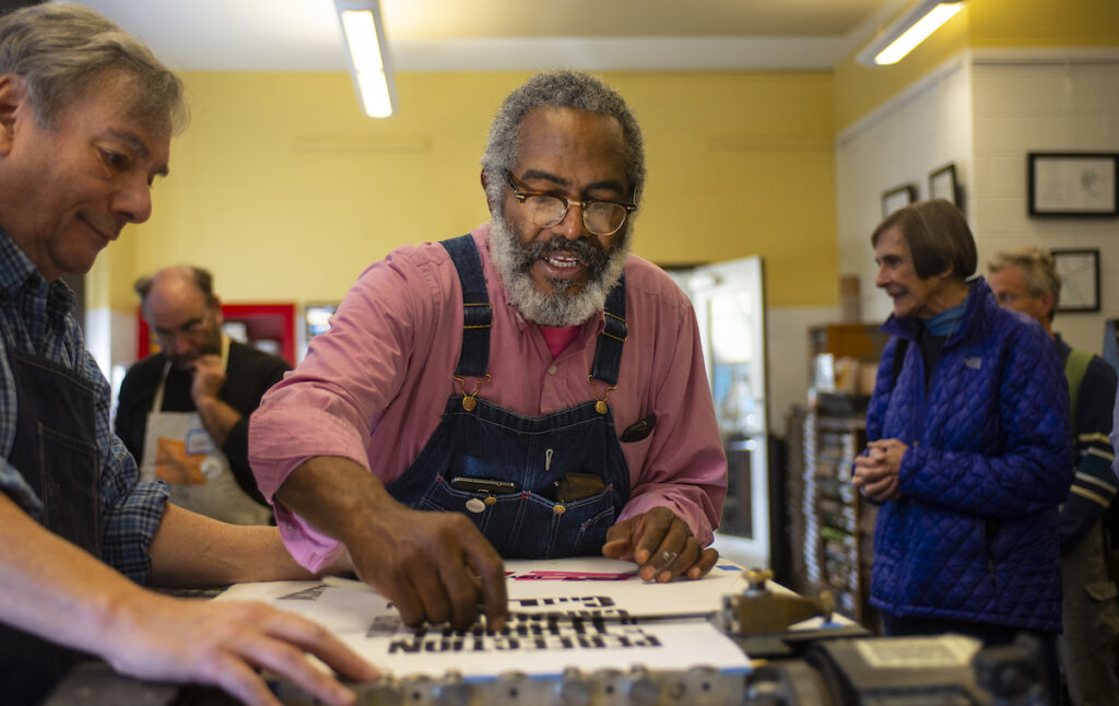 Author and printmaker Amos Paul Kennedy is pictured during an event at the Virginia Book Center in 2018. (Photo by Pat Jarrett/Virginia Humanities, via Creative Commons License)
