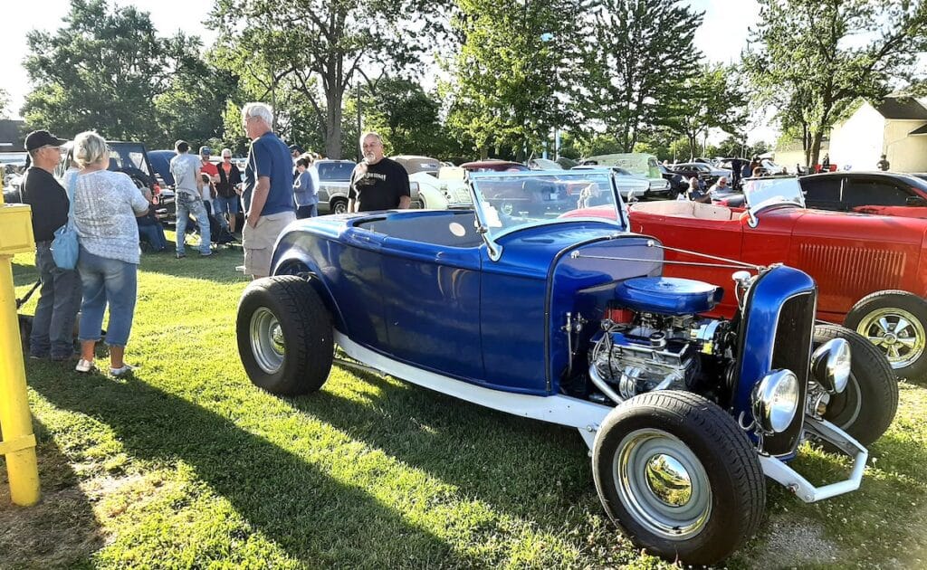 People take in the cars on display at the June 2024 car show at the Lenawee County Fair and Event Grounds. Car shows will return to the fairgrounds starting in May and continue on the first Friday of every month through October. (Photo courtesy of David Spencley)