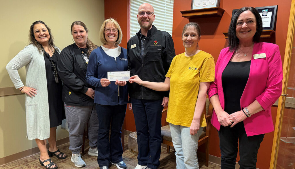 Gleaner Life Insurance Society and its employees donated $16,565 to Hospice of Lenawee through the Gleaner Gives campaign. Pictured here are Lupe Hamden and Angie Ashby with Hospice, Donna Coleman from Gleaner, Travis Havens from Hospice, Sabrina Mehan from Gleaner, and Heather Perez from Hospice.