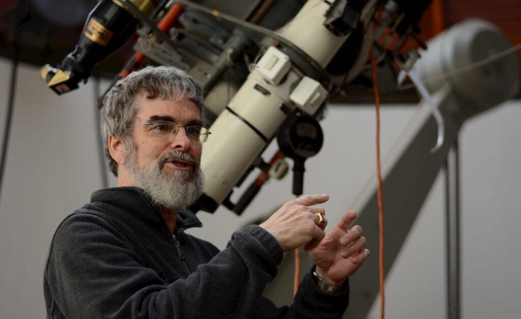Brother Guy Consolmagno of the Society of Jesuits is pictured at the Zeiss Refractor in Castel Gandolfo in Italy. Consolmagno, director of the Vatican Observatory, spoke on March 13 at the Weber Retreat and Conference Center in Adrian. (Courtesy of the Vatican Observatory)