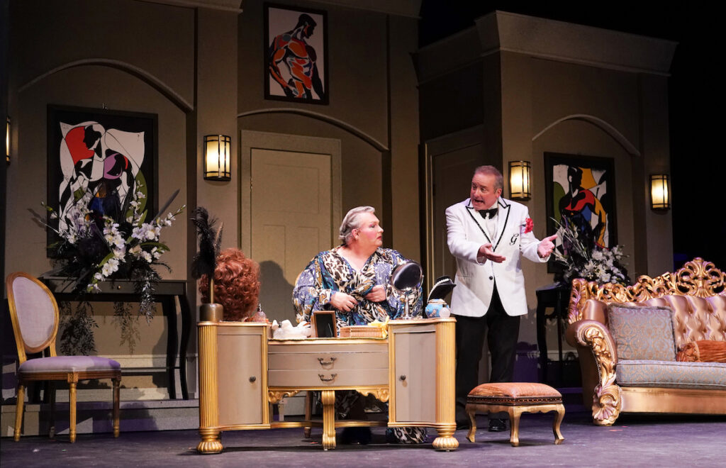 Johnny Reed of Toledo, playing Albin, and Eric Parker of Adrian as Georges are pictured in a scene from "La Cage Aux Folles" at the Croswell Opera House. (Photo by Lad Strayer)