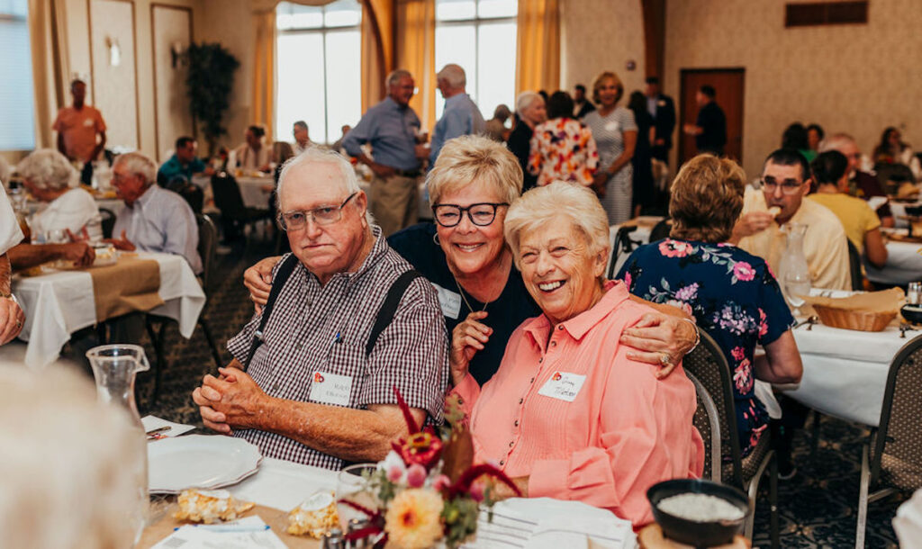 Ralph and Ginny Tillotson, longtime donors of corn to Habitat for Humanity’s Farm to Table Dinner, are pictured at the 2024 dinner with Pam Van Doren, representing the Sage Foundation.