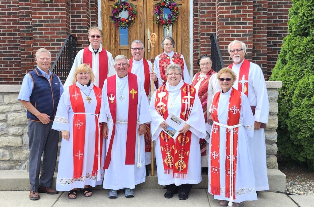 Joining the pastor and members of Immanuel Lutheran Church to celebrate the church’s anniversary were a former pastor, the bishop of the Southeast Michigan Synod, and several pastors who either interned at the church on their way to becoming ordained or have been connected to the church in some other way. In the front row are Revs. Rick Webb, Denise Russell, Gary Leking (former pastor), Melinda VanderSys, and Janice Locke. In the back row are Rev. Dale Hedblad, Bishop Donald Kreiss, and Revs. Katherine Kolodziejczyk, Doris Sparks, and Rick Hogan, the current pastor. (Photo by Erik Gable)