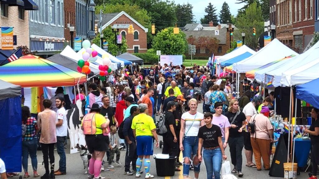 People fill South Main Street in downtown Adrian for Lenawee Pride in 2023. After being in Tecumseh last year, the event will return to downtown Adrian in 2025. It will take place in the City Market Pavilion, 115 Toledo St. (Photo courtesy of Joshua Franck)