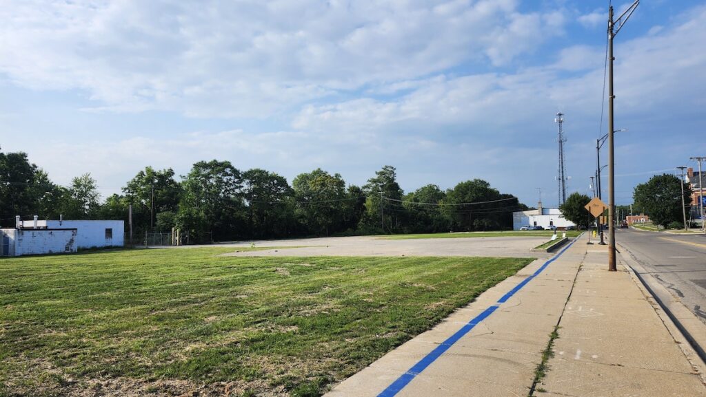 The site of the planned Winter Street riverfront project, with Courthouse Commons in the background.