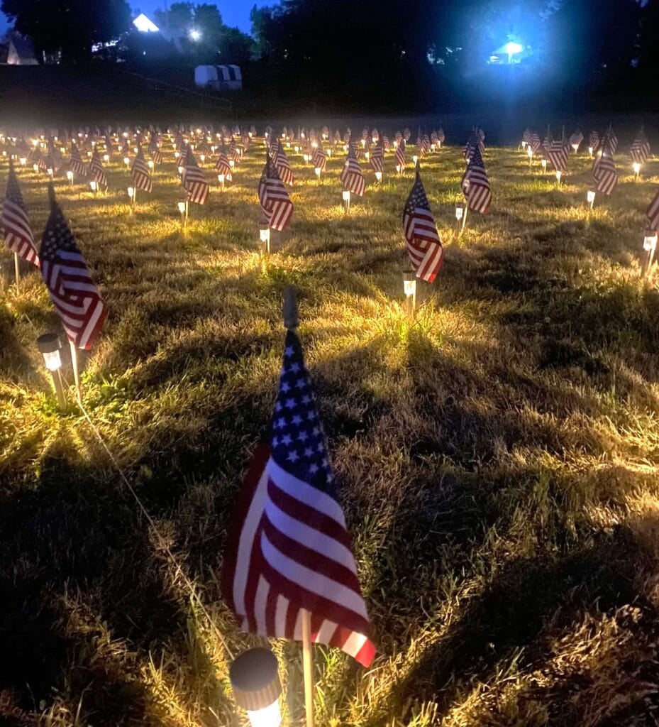 “The Ongoing Cost of War,” an annual flag and light display highlighting veterans who have died through suicide, is organized each year in Clayton by the local organization VALOR, which stands for Veterans and Loved Ones Resources. (Photo courtesy of Brianna Johnston)