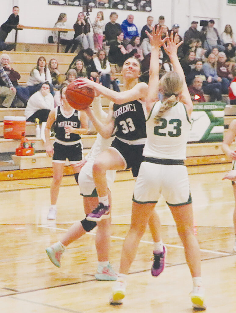 Morenci’s Emersyn Bachelder, shown during a game last year against Sand Creek, is one of several strong seniors who could help the Bulldogs win a state title this year. (Photo by Justin Joughin)