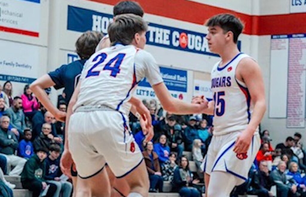 Seniors Jaxon Salenbien (24) and Dan Scrupsky (15) return to the Lenawee Christian boys basketball team this season. (Photo courtesy of LCS