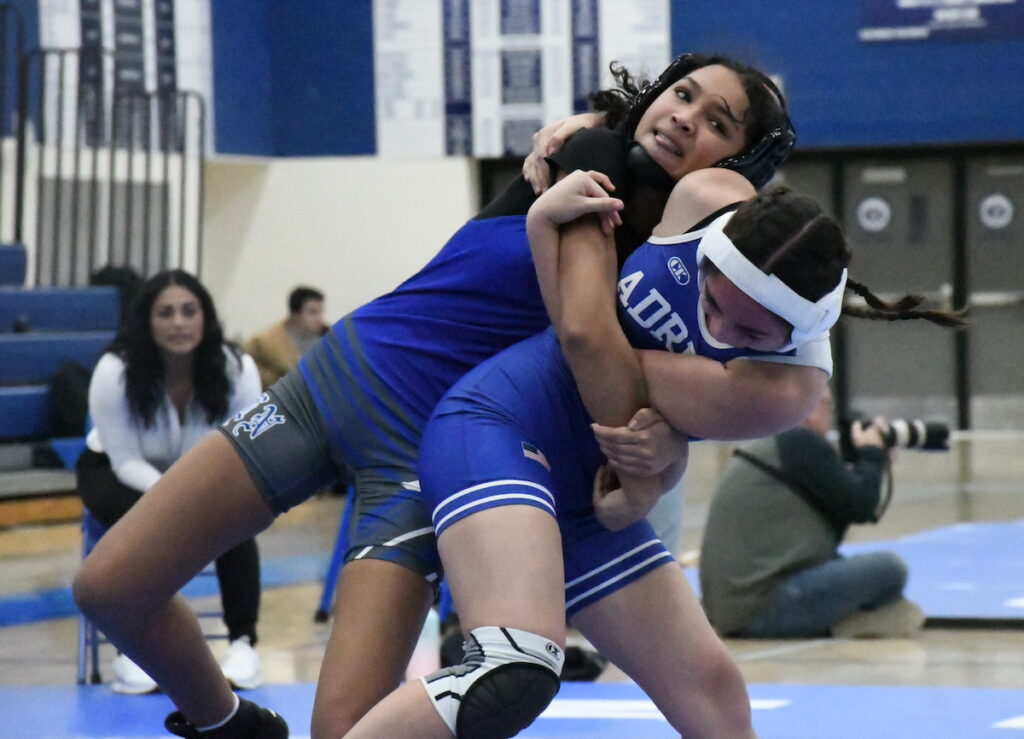 Alayna Rosas tries to throw her opponent to the mat during the first meet hosted by the AHS girls wrestling program on Jan. 9.