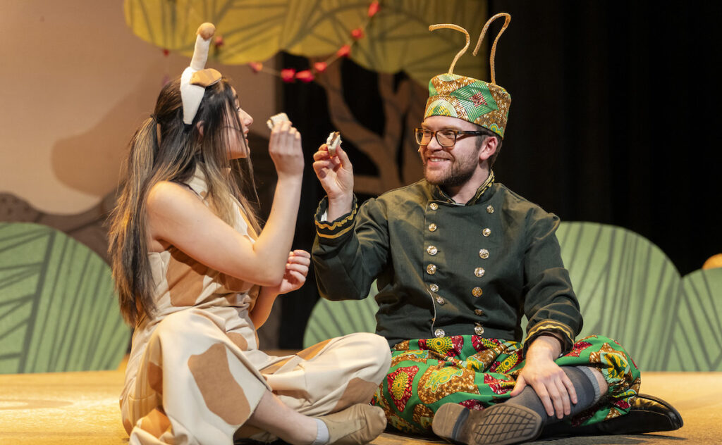 Delayna Garcia as Gerald the Giraffe and Mitchell LaRoy as Cricket are pictured in a scene from "Giraffes Can't Dance" at the Croswell Opera House. (Photo by Ashlee Sayles)