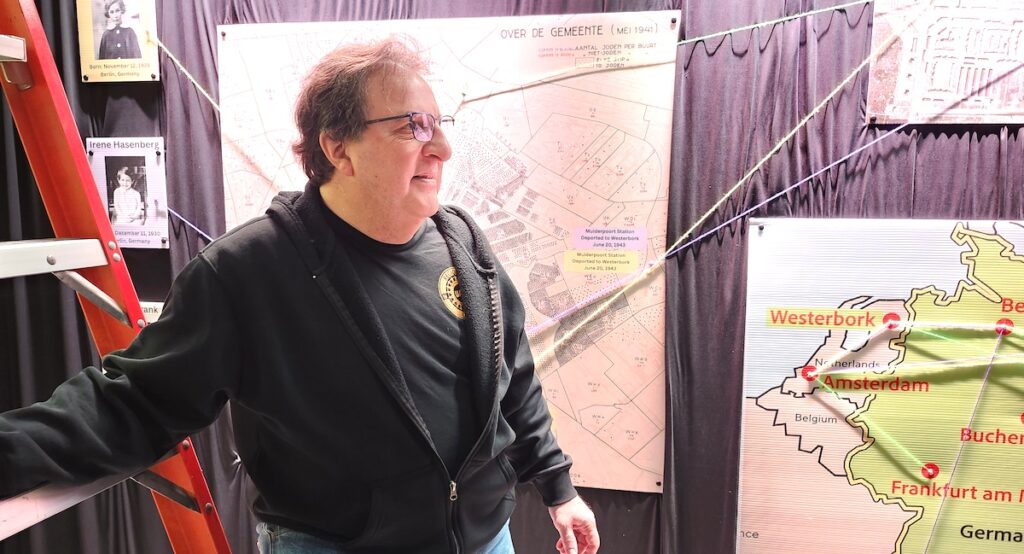 Joe Dimech is one of the local volunteers who helped build displays for the temporary Holocaust museum in downtown Adrian.