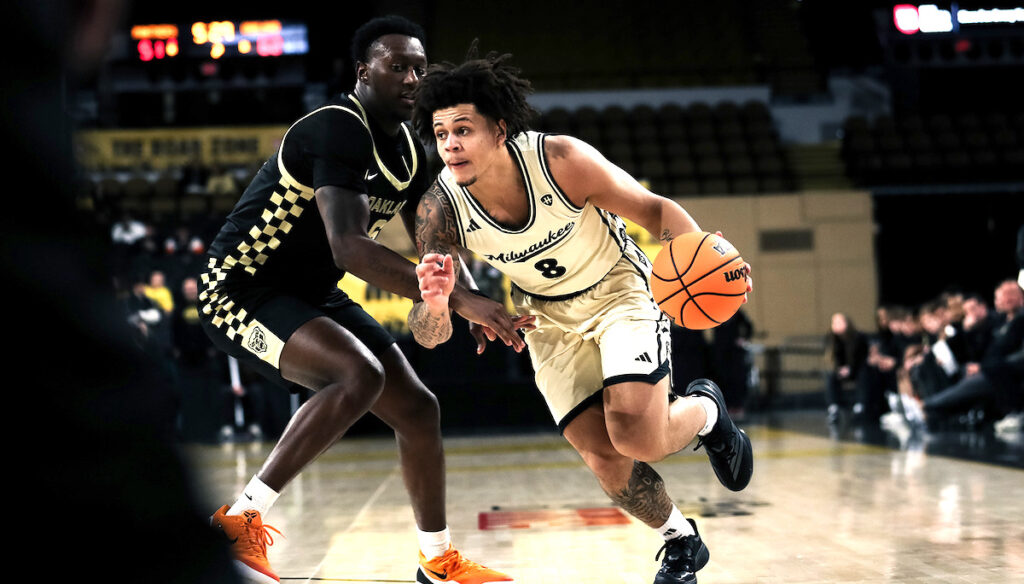 Stevie Elam, an Adrian High School graduate who’s now a freshman on the basketball team at the University of Wisconsin–Milwaukee, is pictured during a Jan. 15 game against Oakland. (Photo courtesy of UW-Milwaukee)