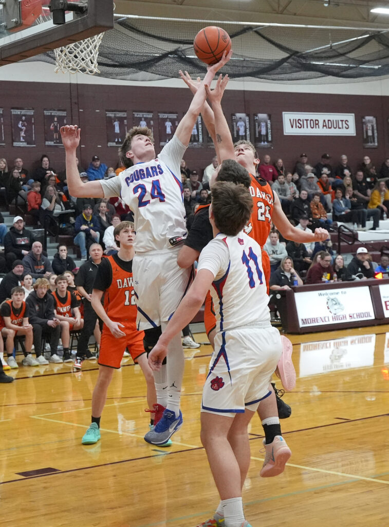 Lenawee Christian’s Jaxon Salenbien, pictured during the District game against Summerfield, became Lenawee County’s all-time leading scorer this season. (Photo by Mike Dickie)