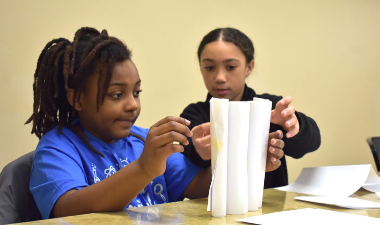 Loveli Russell and Angelina Harrison, both fourth-graders at Michener Elementary School in Adrian, work on a challenge at the Tri-County Science Olympiad, organized by the Lenawee Intermediate School District and hosted by Adrian College. (Photos courtesy of the LISD)