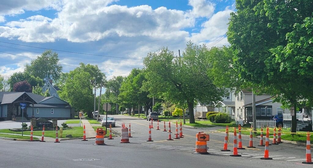 Barrels and cones at the intersection of East Maple Avenue and East Maumee Street show the planned future traffic pattern at the intersection. (Photo by Erik Gable)