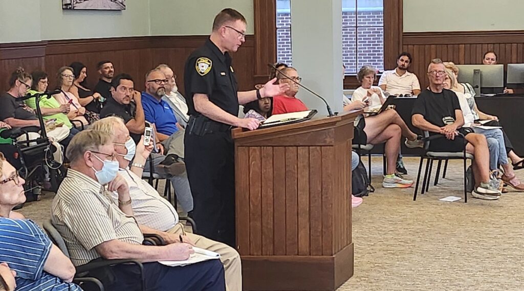 Deputy police chief Laurence VanAlstine speaks at the July 6 Adrian City Commission meeting.