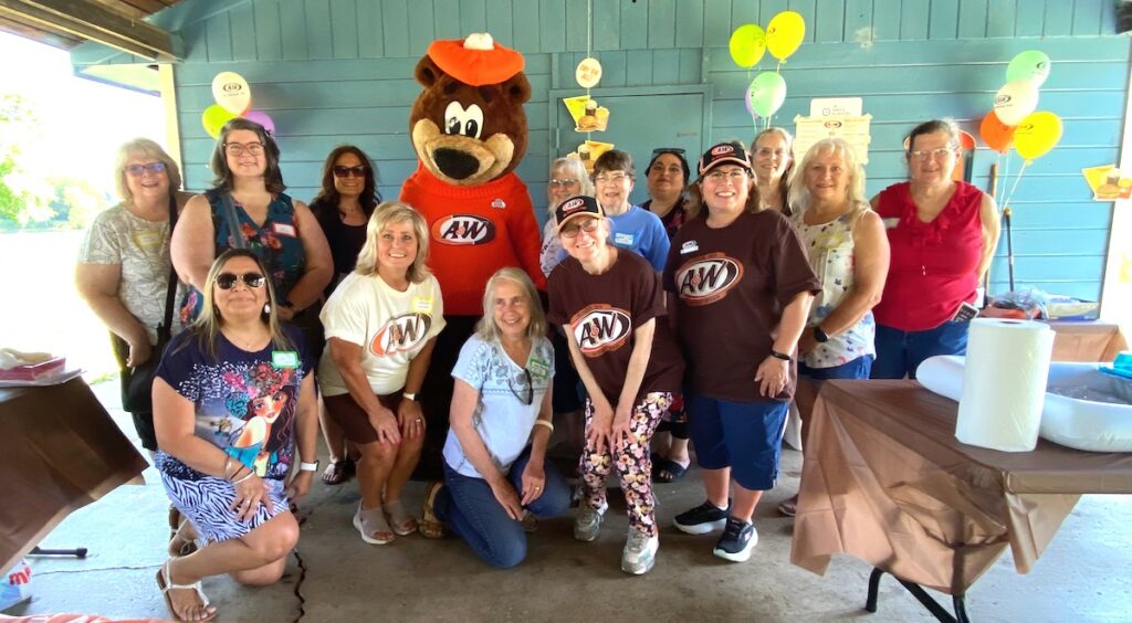 Former employees of the Adrian A&W restaurant gathered for a reunion on June 28. Pictured here are, in the back row, Deanna Dowling Baird, Doreen Dowling Cheng, Kim Meyers Kelly, Sue Shulters Fuss, Linda Ridley, Rebecca Salazar Pabolo, Sarah Perez, Alison Lyos Prielipp, and Julie Clemes; and in the front row, Lupe Salazar Hamden, Kim Carnahan Herbert, Judy Stone, Mikie Rion, and Renee Carnahan Stewart. The guest book also included Tammy Drogowski Kolle, Mary Lorenc, Michelle Kopke Blackerby, Denene Ward Yarger, Casey McAdams, Pam Ward Ford, Vicki Carlson, Belinda Carson Lolley, Joann Rutledge Townsend, Don Rutledge Jr., Lisa Kline Saveti, Sherry Stone, Pat Rion Bagrow, and Panouli Bagrow Harpst.