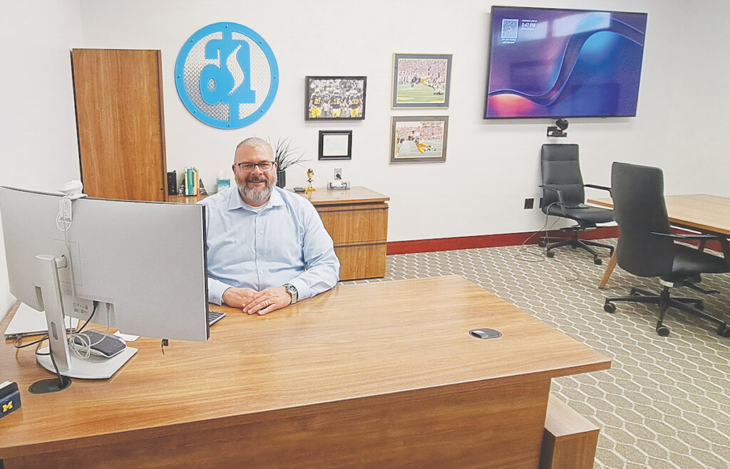 CEO Marc Jackson, pictured in his office at Adrian Steel, says the company’s upcoming 112,000-square-foot expansion in Adrian will add the capacity it needs for the future. (Photo by Arlene Bachanov)