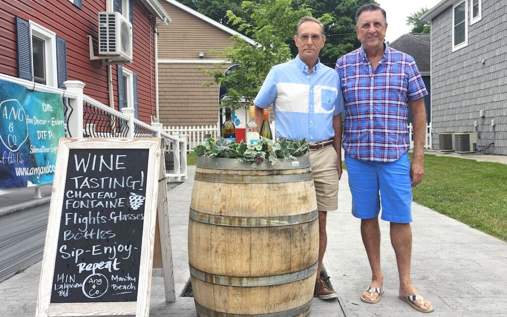 Jose Malagon and Dave Gajda have been working to facilitate a series of tasting rooms for Michigan wineries inside existing Manitou Beach stores. (Photo by Erik Gable)