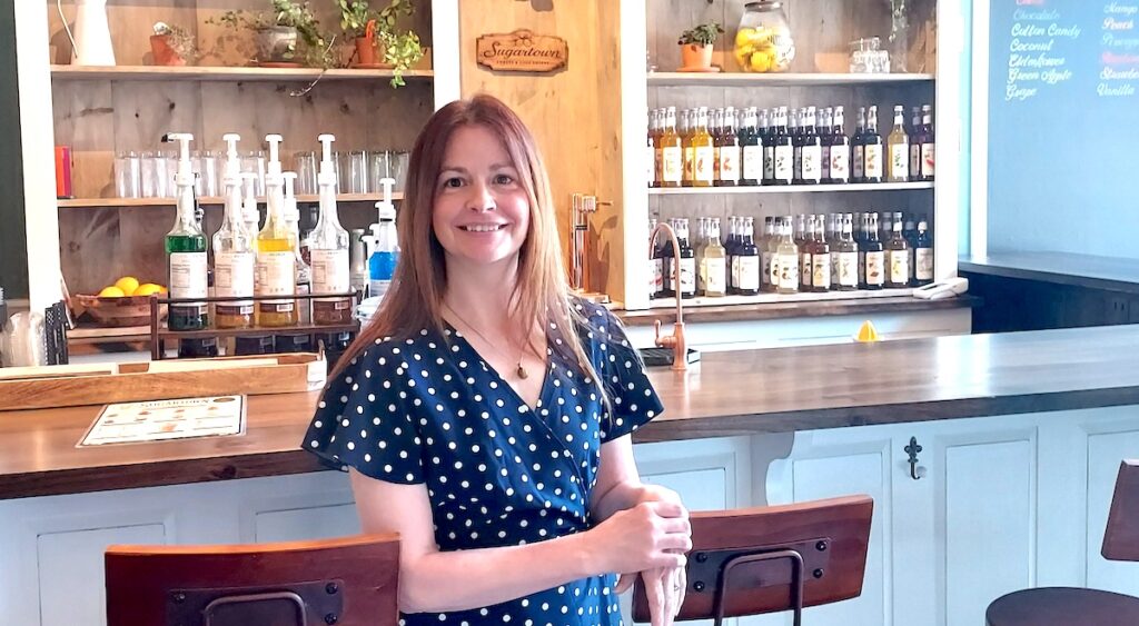 Kimberly Precour is pictured inside her new store, Sugartown Sweets & Soda Shoppe. (Photo by Julie C. Clemes)