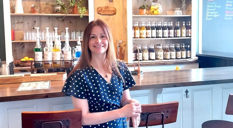 Kimberly Precour is pictured inside her new store, Sugartown Sweets & Soda Shoppe. (Photo by Julie C. Clemes)