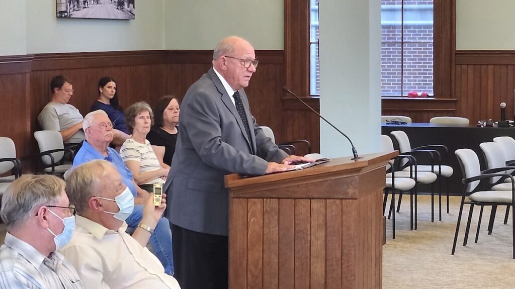 Ted Andrzejewski speaks to the Adrian City Commission during his interview for the interim city administrator position on Aug. 20.