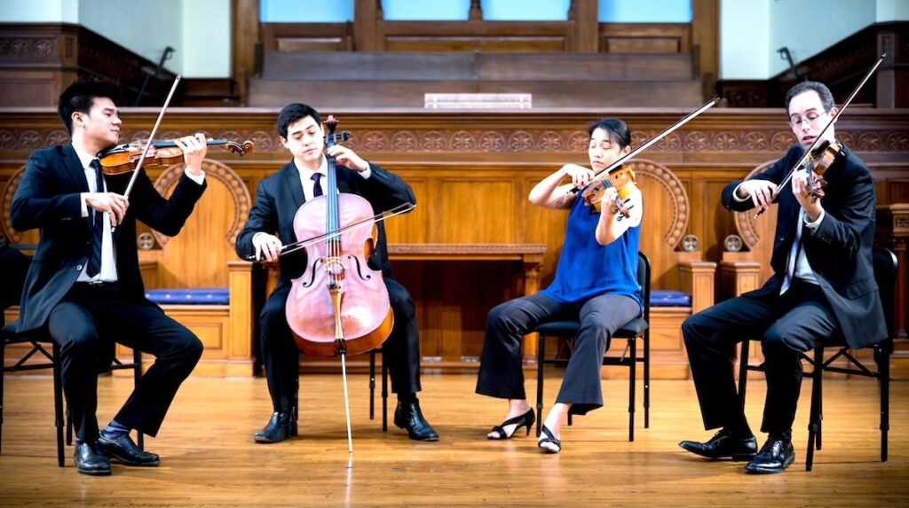 The Telegraph String Quartet, which will perform on Aug. 26 in Holy Rosary Chapel, is made up of violinist Eric Chin, cellist Jeremiah Shaw, violist Pei-Ling Lin, and violinist Joseph Maile. (Photo courtesy of Telegraph String Quartet)