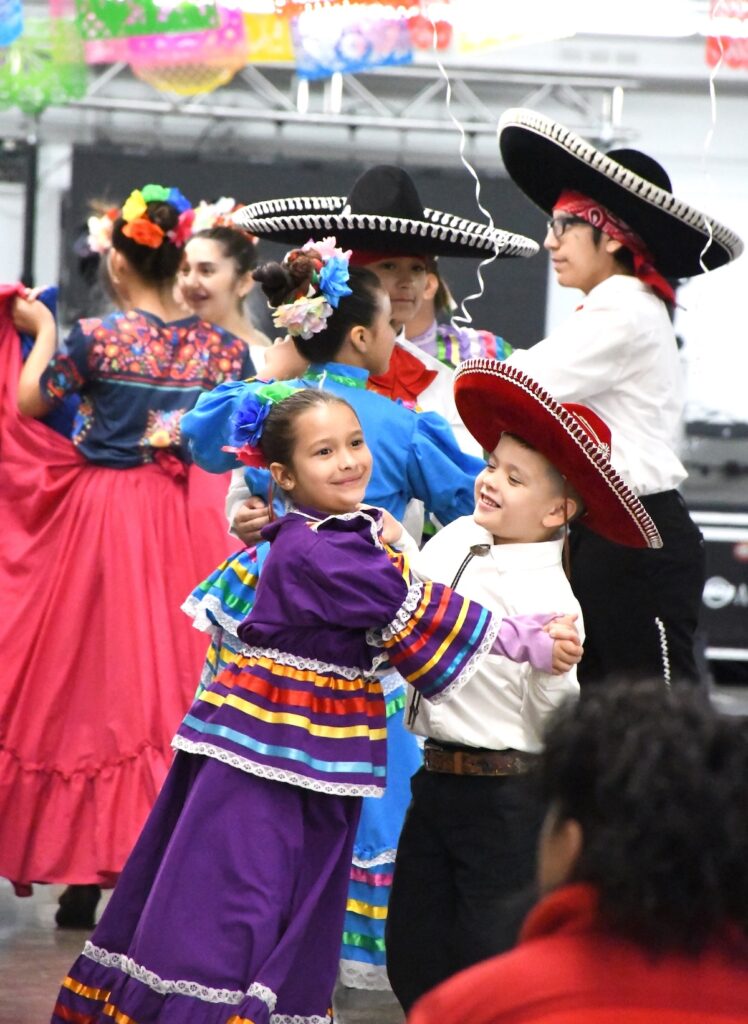 Two of the younger dancers in Raíces de mi Tierra, Adelina Toy and Max Trejo, are pictured at this year's Cinco de Mayo celebration.